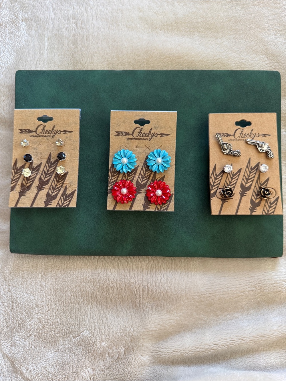 NWT - Never worn. Lot of 3 sets of earrings. Super cute.